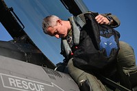 Daily Flightline Operations at Columbia Metropolitan AirportU.S. Air Force Maj. Luke Weyhmuller, 157th Fighter Squadron F-16 fighter jet pilot, assigned to the 169th Fighter Wing at McEntire Joint National Guard Base, South Carolina, conducts preflight checks before takeoff at the Columbia Metropolitan Airport in West Columbia, South Carolina, September 15, 2022. The 169th Fighter Wing is temporarily flying out of Columbia Metropolitan Airport while the McEntire Joint National Guard Base runway undergoes construction. (U.S. Air National Guard photo by Airman 1st Class Amy Rangel, 169th Fighter Wing Public Affairs)