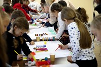 Children painting in arts class. Original public domain image from Flickr