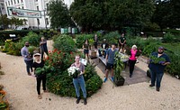 Mrs. Christie Vilsack and USDA Volunteers tend to thePeople's Garden located next to the USDA Whitten Building in Washington D.C., on Sept. 22, 2022. USDA photo by Christophe Paul.