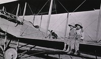 Two Mexican Children Sitting on Airplane 