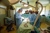 Pacific Partnership 2022 doctors perform surgery at Kilu’ufi Provincial Hospital 220908-N-AU520-3032KILU’UFI, Solomon Islands (Sept. 8, 2022) — Cmdr. Donald Lucas, from Dallas, left, and local surgeons perform a hernia repair on a patient at the Kilu’ufi Provincial Hospital during Pacific Partnership 2022. Now in its 17th year, Pacific Partnership is the largest annual multinational humanitarian assistance and disaster relief preparedness mission conducted in the Indo-Pacific. Pacific Partnership is a unifying mission that fosters enduring friendships and cooperation among many nations. The year’s mission in Solomon Islands includes participants from the United States, Japan and Australia. (U.S. Navy photo by Mass Communication Specialist 2nd Class Jacob Woitzel)