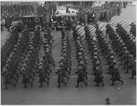 369th Infantry marching on Fifth Avenue, New York City. Returned [African American] troops of the 369th Infantry, the old 15th of New York City, marching in parade in their honor on Fifth Avenue. Original public domain image from Flickr