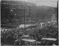 Famous New York soldiers return home. [The] 369th Infantry (old 15th National Guard of New York City) was the first New York regiment to parade as veterans of Great War. General view of parade and reviewing stand, 1917 - ca. 1919. Original public domain image from Flickr