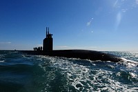 The submarine USS Scranton (SSN 756) pulls into Augusta Bay, Sicily, Italy, to receive supplies and personnel March 6, 2011.