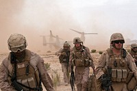 U.S. Marines with Combat Logistics Battalion 8 (CLB-8), 2nd Marine Logistics Group (Fwd.), arrive at the impact site with French soldiers to recover the wreckage of a French Mirage 2000 jet fighter aircraft northwest of Forward Operating Base Delaram, Helmand province, Afghanistan, May 25, 2011.