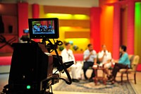 A video camera screen shows U.S. Sailors with the Fleet Forces Band as they are interviewed at the Channel 10 News station July 20, 2011, in San Salvador, El Salvador during Continuing Promise 2011.
