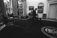 Photograph of President William Jefferson Clinton with Buddy the Dog in the Oval Office: 01/16/1998. Original public domain image from Flickr