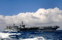 The aircraft carrier USS Carl Vinson (CVN 70), right, conducts a replenishment at sea with the fast combat support ship USNS Bridge (T-AOE 10) in the Pacific Ocean Jan. 2, 2012.