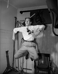 Ed Westcott leaping while testing a strobe in his AEC studio