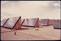 Flat plate solar heating collectors built by the Solaron Corporation, and installed on the roof of the Gump Glass Company in that city.