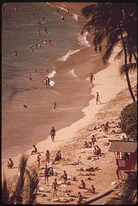 Waikiki Beach is the most popular tourist spot on the island there are 26,000 hotel rooms on Oahu. Most of them are in the Waikiki Beach area, October 1973. Photographer: O'Rear, Charles. Original public domain image from Flickr