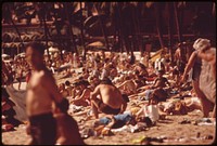 Waikiki Beach is the most popular tourist spot on the island there are 26,000 hotel rooms on Oahu. Most of them are in the Waikiki area, October 1973. Photographer: O'Rear, Charles. Original public domain image from Flickr