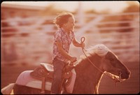 Performer at annual junior rodeo held on Colorado River Indian Reservation at Parker, May 1972. Photographer: O'Rear, Charles. Original public domain image from Flickr