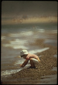 Trying the water at Lake Mead. Lake is formed by giant Hoover Dam, May 1972. Photographer: O'Rear, Charles. Original public domain image from Flickr