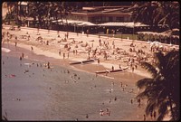 Waikiki Beach is the most popular tourist spot on the island there are 26,000 hotel rooms on Oahu. Most of them are in the Waikiki area, October 1973. Photographer: O'Rear, Charles. Original public domain image from Flickr