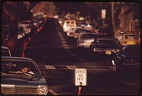 Morning rush hour traffic to Honolulu from the east on Kalanianaole Highway. Clear (reverse flow) lane is reserved for buses, October 1973. Photographer: O'Rear, Charles. Original public domain image from Flickr