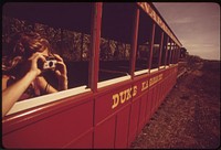 Former sugarcane train is now used for tourists near Lahina, October 1973. Photographer: O'Rear, Charles. Original public domain image from Flickr