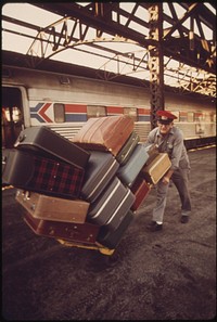 Redcap unloading baggage at Union Station in Kansas City Missouri, June 1974. Photographer: O'Rear, Charles. Original public domain image from Flickr