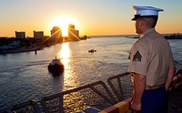 U.S. Marine Corps Sgt. Luis Palomeque, a 1st Battalion, 6th Marine Regiment rifleman stands at the position of attention on the flight deck of USS Wasp (LHD 1) in Fort Lauderdale, Fla., April 25, 2012.