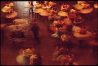 Skirts whirl in the 33rd Annual Square Dance Festival, held in Pershing Auditorium, May 1973. Photographer: O'Rear, Charles. Original public domain image from Flickr