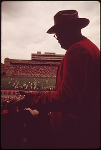 Big sports event of the year is the annual spring football game at the University of Nebraska. This is an intra-squad game, and many fans wear red in honor of the team, nick-named the "Big Red," May 1973. Photographer: O'Rear, Charles. Original public domain image from Flickr