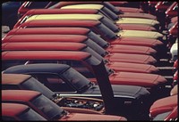 New cars lined up at dockside terminal, June 1973. Photographer: O'Rear, Charles. Original public domain image from Flickr