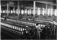Three spinners in spinning room, 1912. Photographer: Hine, Lewis. Original public domain image from Flickr