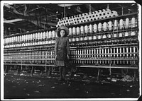 Young spinner in Roanoke Cotton Mills. Said 14 years old, but it is doubtful, May 1911. Photographer: Hine, Lewis. Original public domain image from Flickr