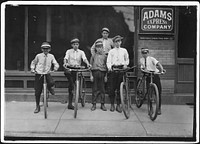 A typical group of Postal Messengers. Smallest on left end, Wilmore Johnson, been there one year, June 1911. Photographer: Hine, Lewis. Original public domain image from Flickr