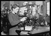 Radio. RCA Victor. Coil winder - If a girl has good fingers for this work, she can become expert on this job in three weeks. If she is not naturally deft, she never learns, March 1937. Photographer: Hine, Lewis. Original public domain image from Flickr