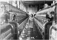 She was working steadily whe the investigator found her. The mills seem full of youngsters who just happened in or are helping sister, December 1908. Photographer: Hine, Lewis. Original public domain image from Flickr