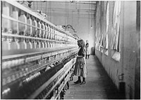 Sadie Pfeifer, 48 inches high. Has worked half a year. One of the many small children at work in Lancaster Cotton Mills, November 1908. Photographer: Hine, Lewis. Original public domain image from Flickr