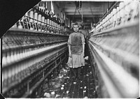 Little spinner in Globe Cotton Mill. Overseer said she was regularly employed there. Augusta, Ga, January 1909. Photographer: Hine, Lewis. Original public domain image from Flickr