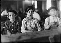 Young cigarmakers in Engelhardt & Co. Three boys looked under 14, January 1909. Photographer: Hine, Lewis. Original public domain image from Flickr