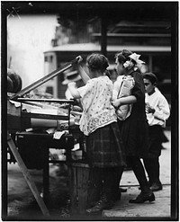 Tending stand, New York City, July 1910. Photographer: Hine, Lewis. Original public domain image from Flickr