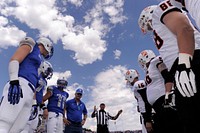 Players meet for a coin toss prior to the start of the U.S. Air Force Academy's opening football game against the Idaho State Bengals at Falcon Stadium in Colorado Springs, Colo., Sept. 1, 2012.