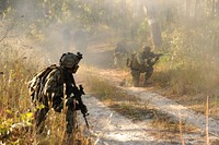 U.S. Sailors participating in Riverine Combat Skills (RCS) course class 13-010 conduct a simulated patrol during the medical combat scenario of a field training exercise at Camp Lejeune, N.C., Oct. 24, 2012.