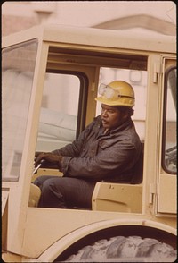 Black Street Worker In Chicago. From 1960 To 1970 The Percentage Of Chicago Blacks With An Income Of $7,000 Or More Jumped From 26 To 58%, 10/1973. Photographer: White, John H. Original public domain image from Flickr