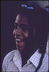 A Black Girl Pictured While Shopping With Her Family On 47th Street On Chicago's South Side, 06/1973. Photographer: White, John H. Original public domain image from Flickr