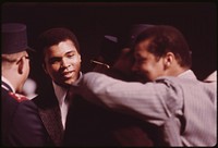 World Heavyweight Boxing Champion Muhammad Ali, A Black Muslim, Attends The Sect's Service To Hear Elijah Muhammad Deliver The Annual Savior's Day Message In Chicago, 03/1974. Photographer: White, John H. Original public domain image from Flickr