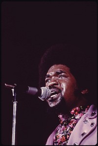 Black Singer Performs At The International Amphitheater In Chicago, 10/1973. Photographer: White, John H. Original public domain image from Flickr