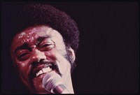 Black Soul Singer Johnny Taylor Performs At The International Amphitheater In Chicago, 10/1973. Photographer: White, John H. Original public domain image from Flickr