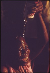 Summer Fun Means Cooling Off With Water From A Fire Hydrant At Woodlawn Community, 06/1973. Photographer: White, John H. Original public domain image from Flickr