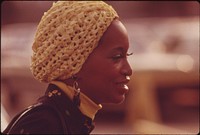 Young Woman Soliciting Funds For A Chicago Organization In A Shopping Center Parking Lot, 08/1973. Photographer: White, John H. Original public domain image from Flickr