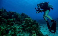 U. S. Navy Petty Officer 2nd Class Kathleen Gorby conducts underwater photography training off the coast of Guantanamo Bay, Cuba, on April 19, 2013.