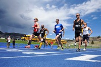 Athletes sprint from the starting line during the men’s open 1,500-meter race as part of the 2013 Warrior Games in Colorado Springs, Colo., May 14, 2013.