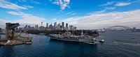 The U.S. 7th Fleet amphibious command ship USS Blue Ridge (LCC 19) approaches the Royal Australian Navy's Fleet Base East on Garden Island in Sydney July 15, 2013, for a port visit before exercise Talisman Saber 2013.