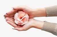 Pink flower, feminine hand holding and cupping paper craft decoration