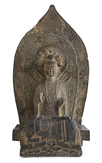 Seated figure of the Buddha Sakyamuni in high relief