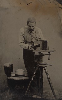 Unidentified photographer in field